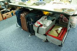 FOUR SUITCASES AND VANITY CASES AND A QUANTITY OF CHRISTMAS DECORATIONS AND A CHRISTMAS TREE