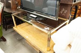 A GLASS TOP COFFEE TABLE ON GILT METAL BASE