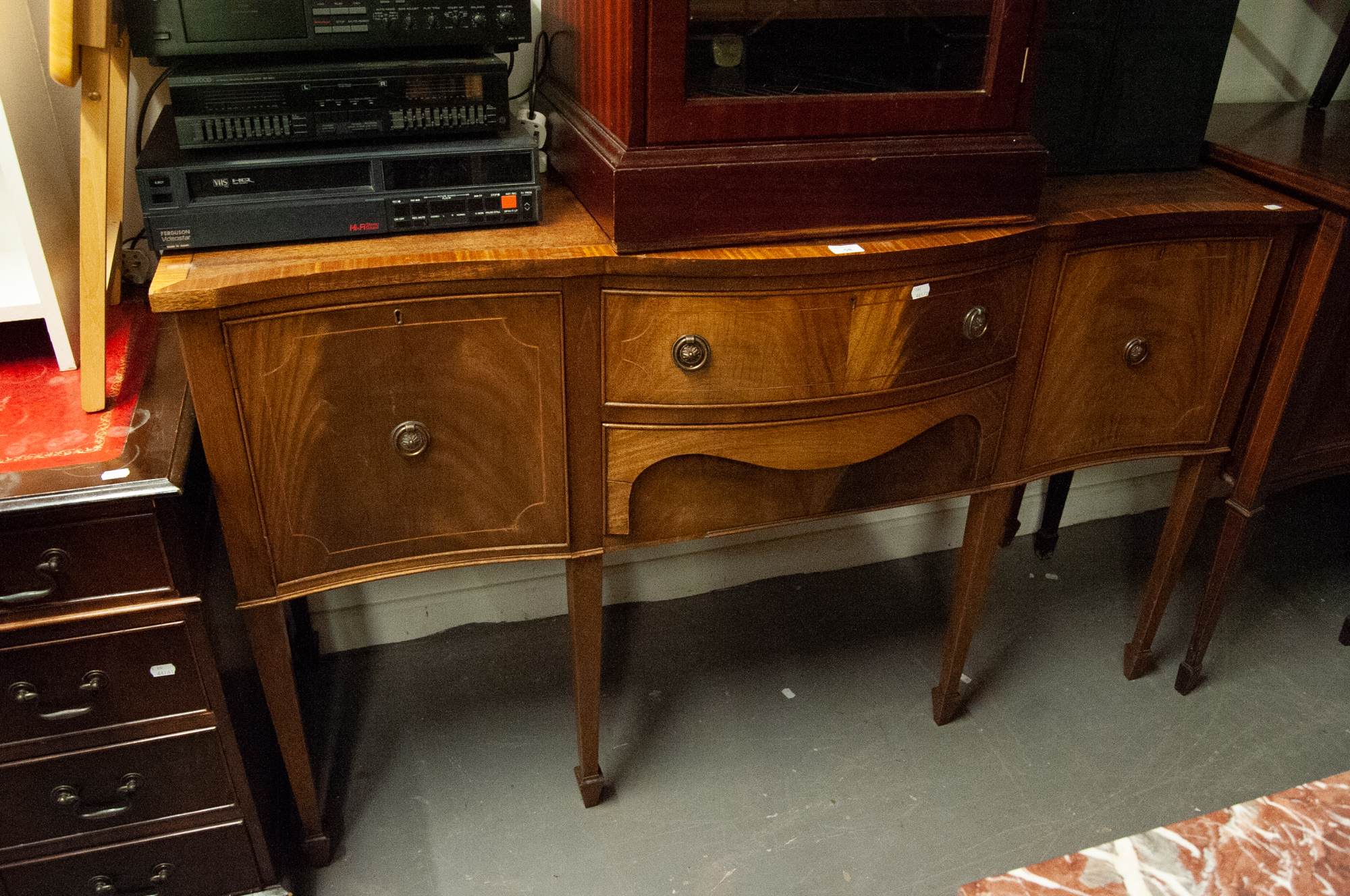 A TWENTIETH CENTURY REPRODUCTION SERPENTINE FRONTED MAHOGANY INLAID SIDEBOARD