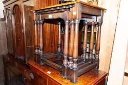 A NEST OF THREE JACOBEAN STYE OAK OBLONG COFFEE TABLES