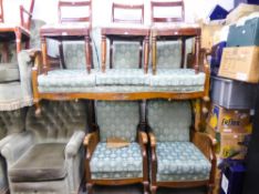 A BERGERE LOUNGE SUITE OF THREE PIECES WITH CARVED DECORATION (SOME DAMAGE TO WICKER)