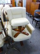 A CREAM HIDE UPHOLSTERED SWIVEL ARMCHAIR, ON FOUR SPLAYED LEGS AND THE MATCHING POUFFE