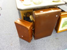 A BROWN LEATHER SUITCASE AND A 'HERCULAX' VULCANISED EXAMPLE (2)