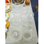 A COLLECTION OF GLASS TABLE WARES TO INCLUDE; PATES, BOWLS WITH BEAD RIM DETAIL, FRUIT BOWL,, JUG