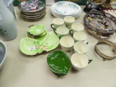 A SET OF CARLTON WARE SIX LEAF DISHES WITH TRIPLE SERVING PLATE AND EIGHT COFFEE CUPS