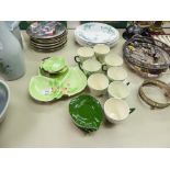A SET OF CARLTON WARE SIX LEAF DISHES WITH TRIPLE SERVING PLATE AND EIGHT COFFEE CUPS