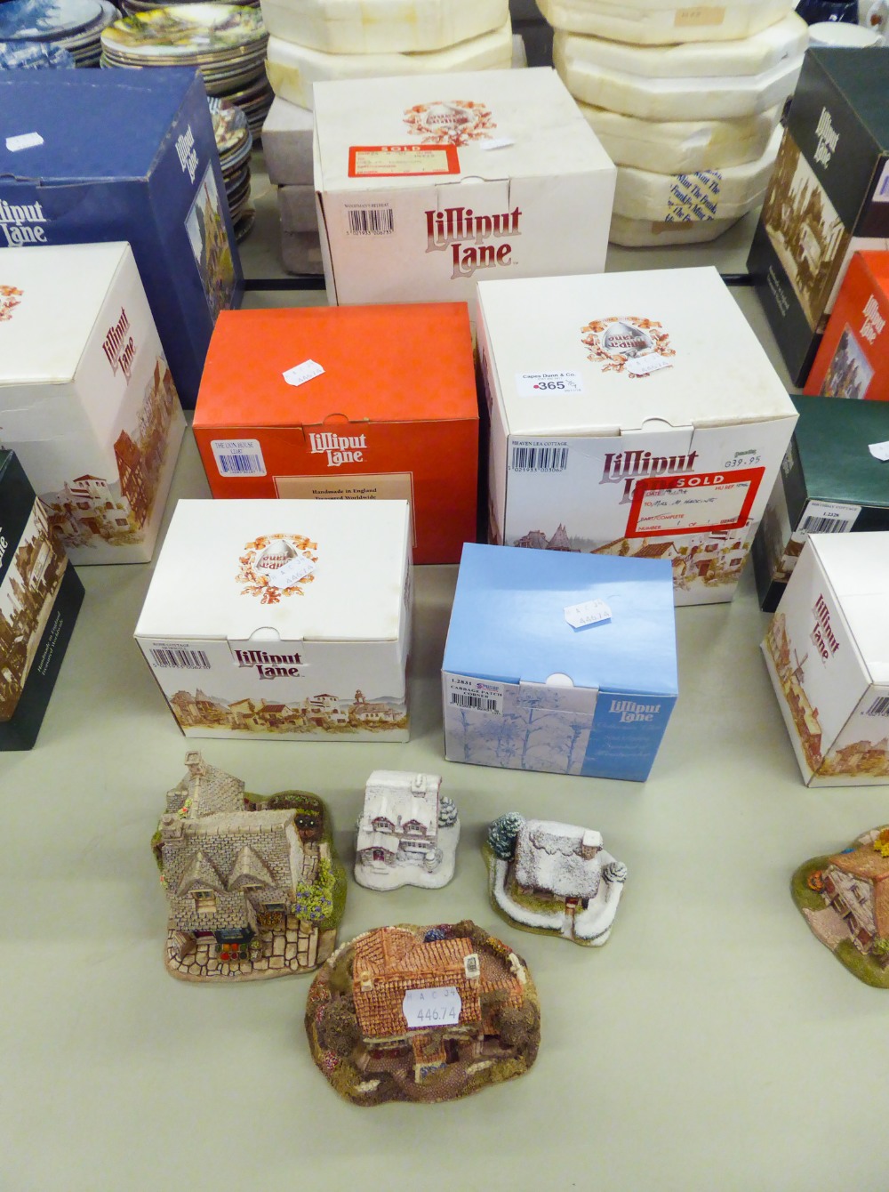 NINE LILLIPUT LANE MODELS TO INCLUDE; FIVE BOXED, WOODMANS RETREAT, LION HOUSE, HEAVEN LEA