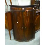 A VICTORIAN MAHOGANY CORNER CABINET, SOLID DOORS WITH IVORY ESCUTCHEONS