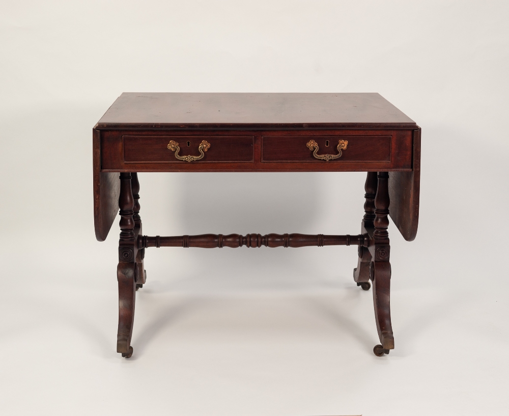 REGENCY FIGURED MAHOGANY SOFA TABLE, of typical form with two cockbeaded frieze drawers, raised on