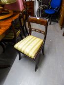 A SET OF SIX REGENCY STYLE MAHOGANY SABRE LEG DINING CHAIRS, WITH FABRIC COVERED TRAFALGAR SEAT (6)