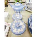 THREE PIECES OF BLUE WEDGWOOD; TEAPOT, ROUND BOX AND COVER AND ANOTHER (3)