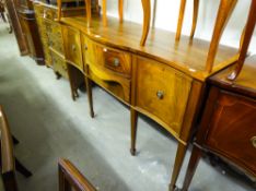 A TWENTIETH CENTURY REPRODUCTION INLAID MAHOGANY SERPENTINE SIDEBOARD, HAVING TWO CENTRAL DRAWERS