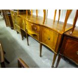 A TWENTIETH CENTURY REPRODUCTION INLAID MAHOGANY SERPENTINE SIDEBOARD, HAVING TWO CENTRAL DRAWERS