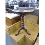 A REPRODUCTION PIE-CRUST TILT-TOP PEDESTAL TABLE