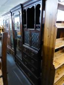 AN EARLY TWENTIETH CENTURY WALNUT BEACONSFIELD WARDROBE WITH MIRROR DOOR, LEAD LIGHT DOORS OVER FIVE