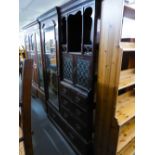 AN EARLY TWENTIETH CENTURY WALNUT BEACONSFIELD WARDROBE WITH MIRROR DOOR, LEAD LIGHT DOORS OVER FIVE