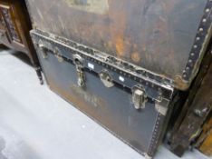 A LARGE FIBRE AND METAL BOUND CABIN TRUNK