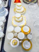 A GLADSTONE CHINA PART TEA SERVICE WITH YELLOW AND GILT DECORATION AND AN ALLERTONS TEA SERVICE