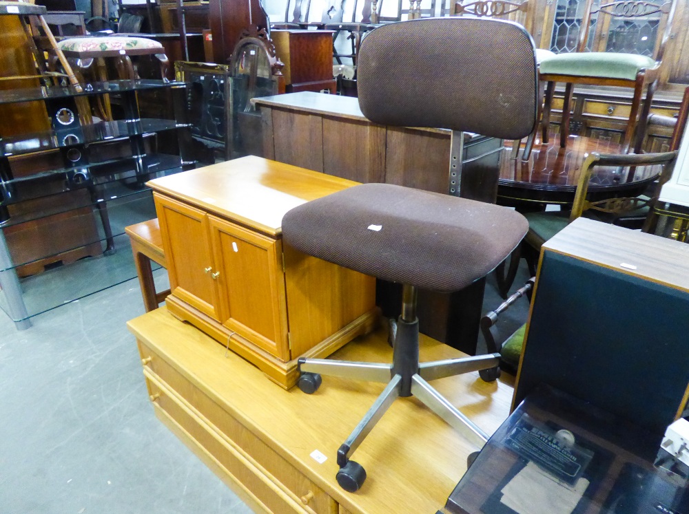 A REVOLVING OFFICE CHAIR AND A TEAL OFFICE DWARF CUPBOARD