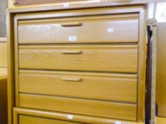 A SET OF THREE 'HULSTA' THREE DRAWER CHESTS, TOGETHER WITH A CORNER UNIT WITH FOLDING CUPBOARD