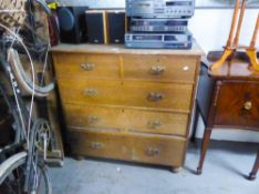 A LATE VICTORIAN OAK CHEST OF DRAWERS