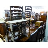 OAK TRESTLE TYPE OBLONG COFFEE TABLE AND A BLACK METAL TOWEL RAIL (2)