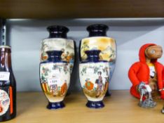 A PAIR OF MODERN JAPANESE HEXAGONAL VASES WITH BLUE GROUND AND PANEL DETAIL AND TWO FURTHER VASES