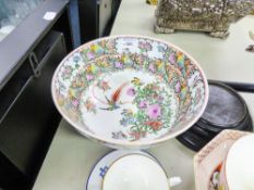 A MODERN CHINESE BOWL DECORATED EXTENSIVELY WITH BIRDS, BUTTERFLY AND FLORAL DESIGN, RAISED ON