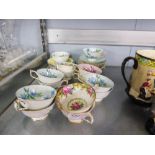 A COLLECTION OF PARAGON TEA CUPS AND SAUCERS (27)