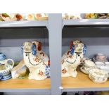 A PAIR OF SILTONE POTTERY STAFFORDSHIRE STYLE DOGS AND AN ARTHUR WOOD PAIR (4)