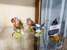 A BESWICK 'NUTHATCH' NO. 2413, A GREY WAGTAIL NO. 1041, A PAIR OF CHAFFINCHES, NO. 991 AND GOLDFINCH