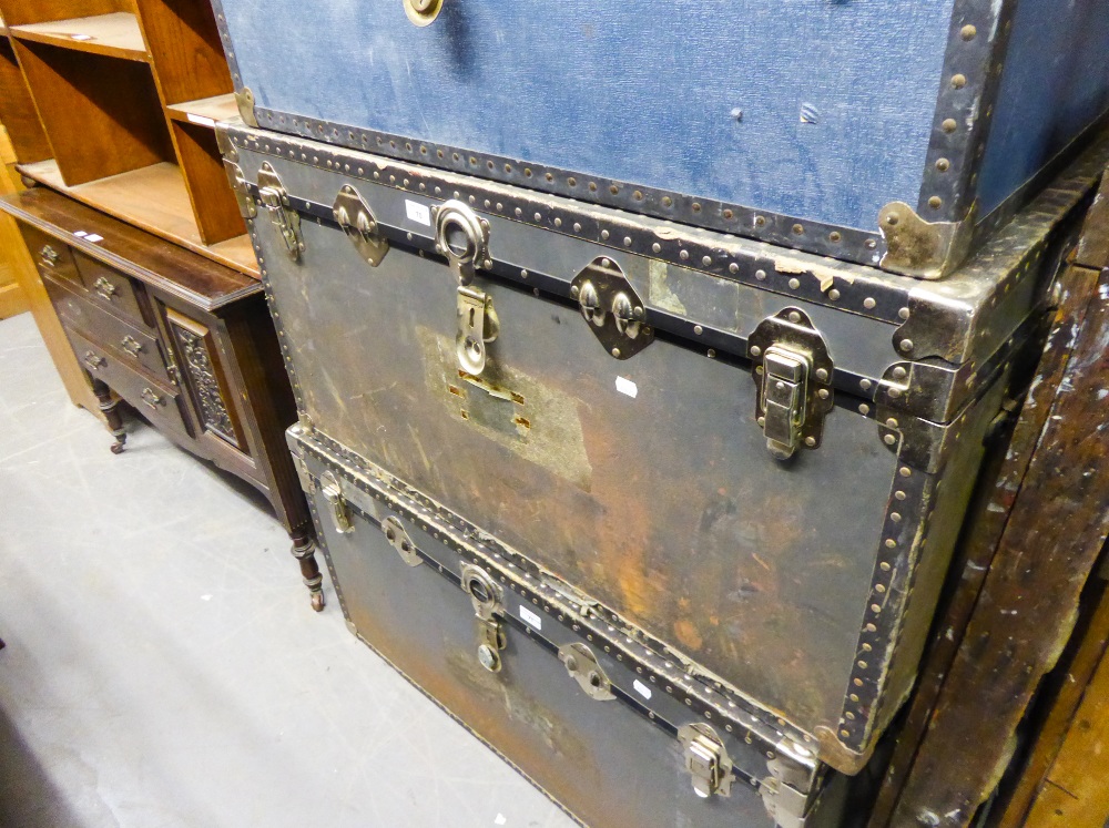 A LARGE FIBRE AND METAL BOUND CABIN TRUNK