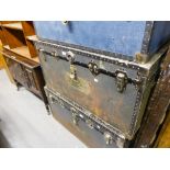 A LARGE FIBRE AND METAL BOUND CABIN TRUNK