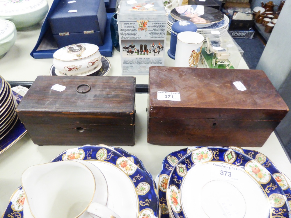 ANTIQUE MAHOGANY OBLONG TEA CADDY AND AN ANTIQUE GRAINED PINE TEA CADDY WITH RING HANDLE ON BALL