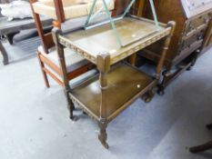 AN OAK TWO TIER DINNER WAGON WITH CARVED GALLERY BORDERS AND A SMALL OAK FOUR TIER OPEN BOOKCASE, 2'