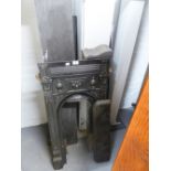 A BLACK SLATE FIRE SURROUND AND A CAST IRON PETITE EXAMPLE (2)