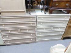A MODERN CREAM PAINTED WOOD CHEST OF DRAWERS WITH AN ARRANGEMENT OF FOUR LONG AND TWO SHORT DRAWERS,