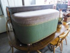 A BEDDING CHEST. UPHOLSTERED IN GREEN AND MAROON