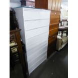 A PAIR OF WHITE PAINTED CHESTS EACH OF FOUR LONG DRAWERS AND THE LOOSE PLATE GLASS PROTECTORS, 2'