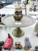 BRASS MODEL OF AN OWL, 3 1/2" HIGH, AND A BENARES ENGRAVED BRASS PEDESTAL CAKE STAND, 10" DIAMETER