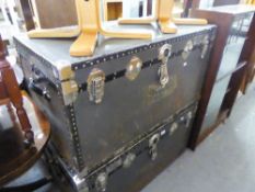 A LARGE FIBRE AND METAL BOUND CABIN TRUNK