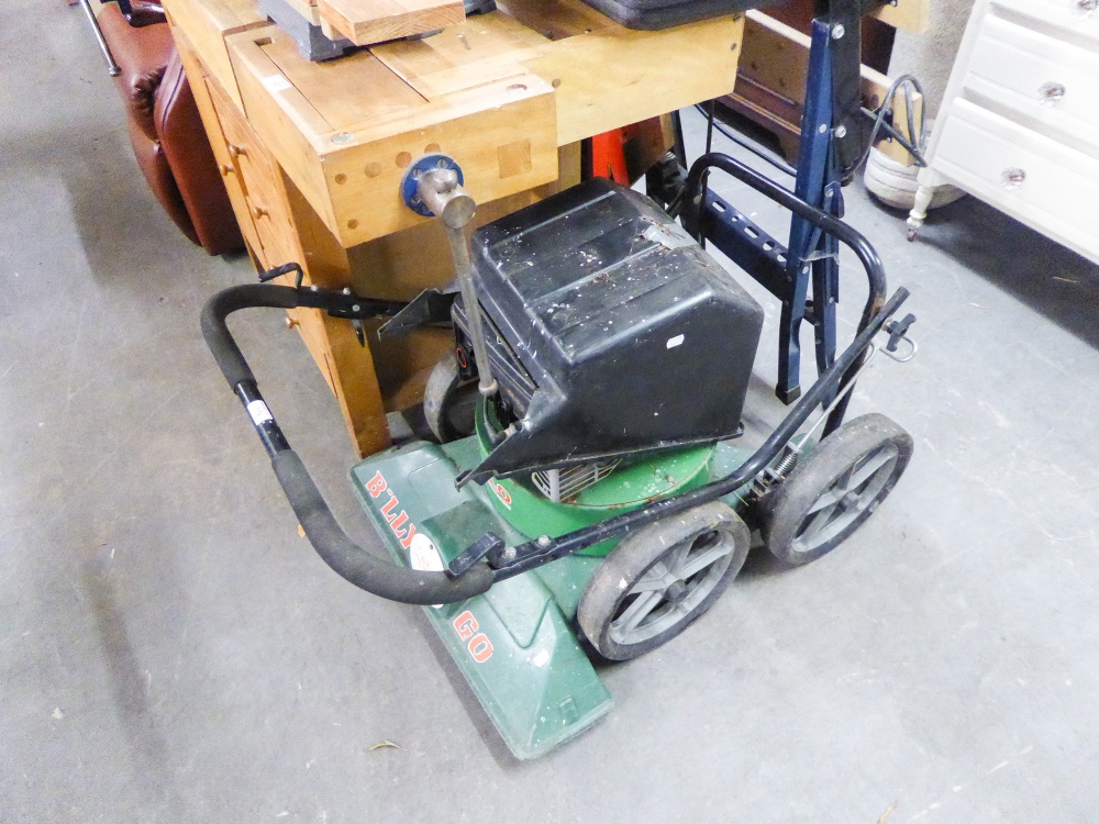 A PETROL DRIVEN ROTARY LAWN MOWER