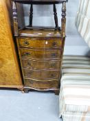 A WALNUTWOOD SMALL SERPENTINE CHEST OF FIVE LONG DRAWERS, 1'9" WIDE