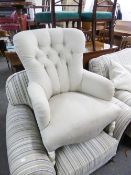 A REGENCY STYLE BUTTON BACK CHAIR (SOILED)