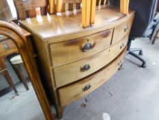 A NINETEENTH CENTURY LOW BOW FRONT MAHOGANY CHEST OF TWO SHORT AND TWO LONG DRAWERS