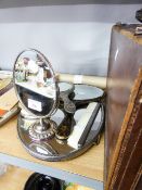 A FOUR PIECE WHITE METAL DRESSING TABLE SET, ANOTHER HAND MIRROR AND A SIMULATED TORTOISESHELL