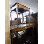 A CARVED AND FIGURED WALNUT WOOD OBLONG COFFEE TABLE WITH INSET GLASS PROTECTOR, ON ACANTHUS