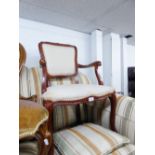 A REPRODUCTION MAHOGANY FRENCH STYLE BEDROOM ARMCHAIR ON CABRIOLE FRONT SUPPORTS