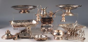 SELECTION OF ELECTROPLATE, inlcuding a desk stand, toast rack, candelabrum (as found), jug, cake