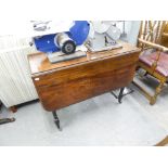 A VICTORIAN MAHOGANY SUTHERLAND TABLE, THE SOLID TOP HAVING CANTED CORNERS, ON TURNED SUPPORTS